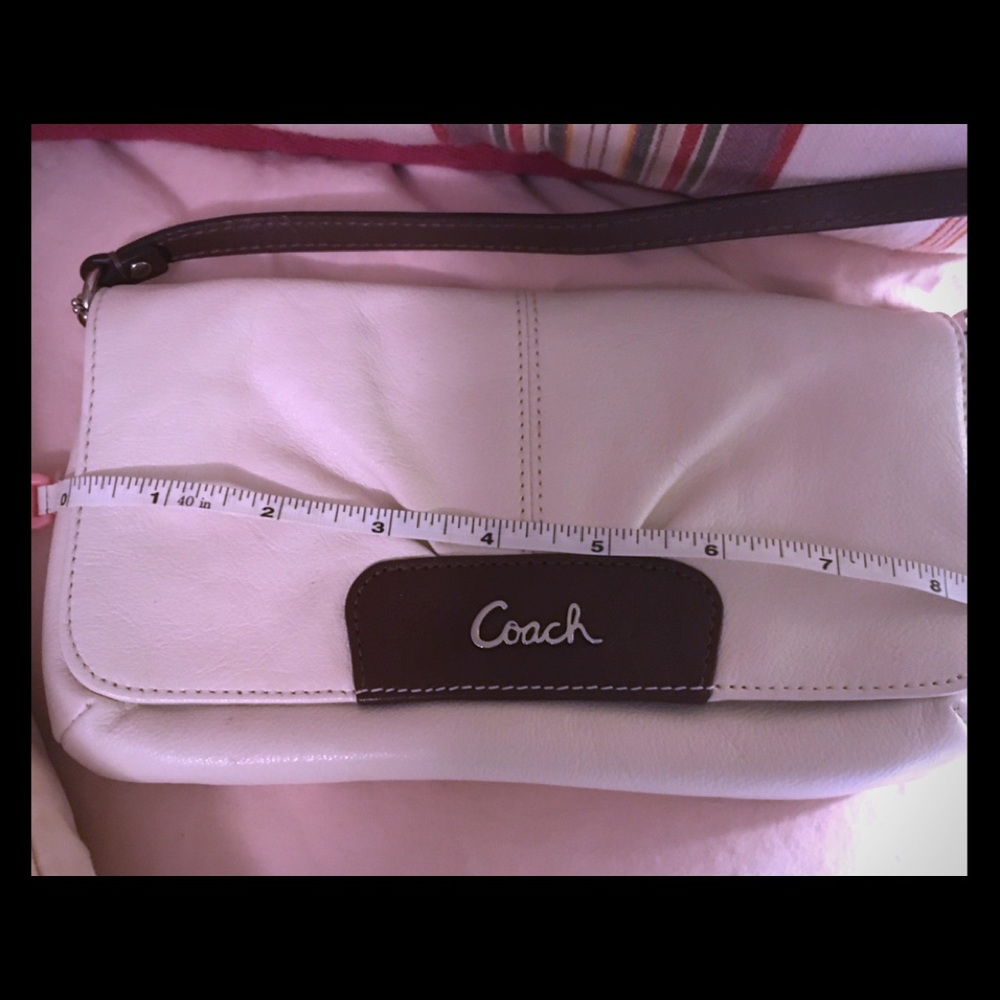 Coach White and tan wristlet +